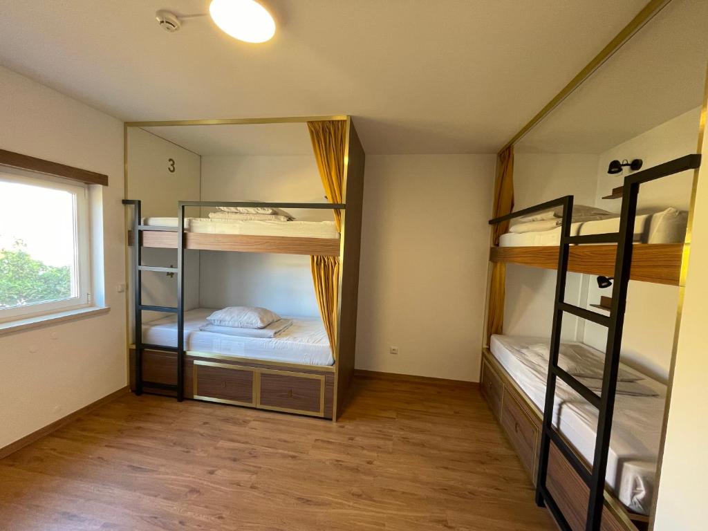 Postel nebo postele na pokoji v ubytování 33 Hostel