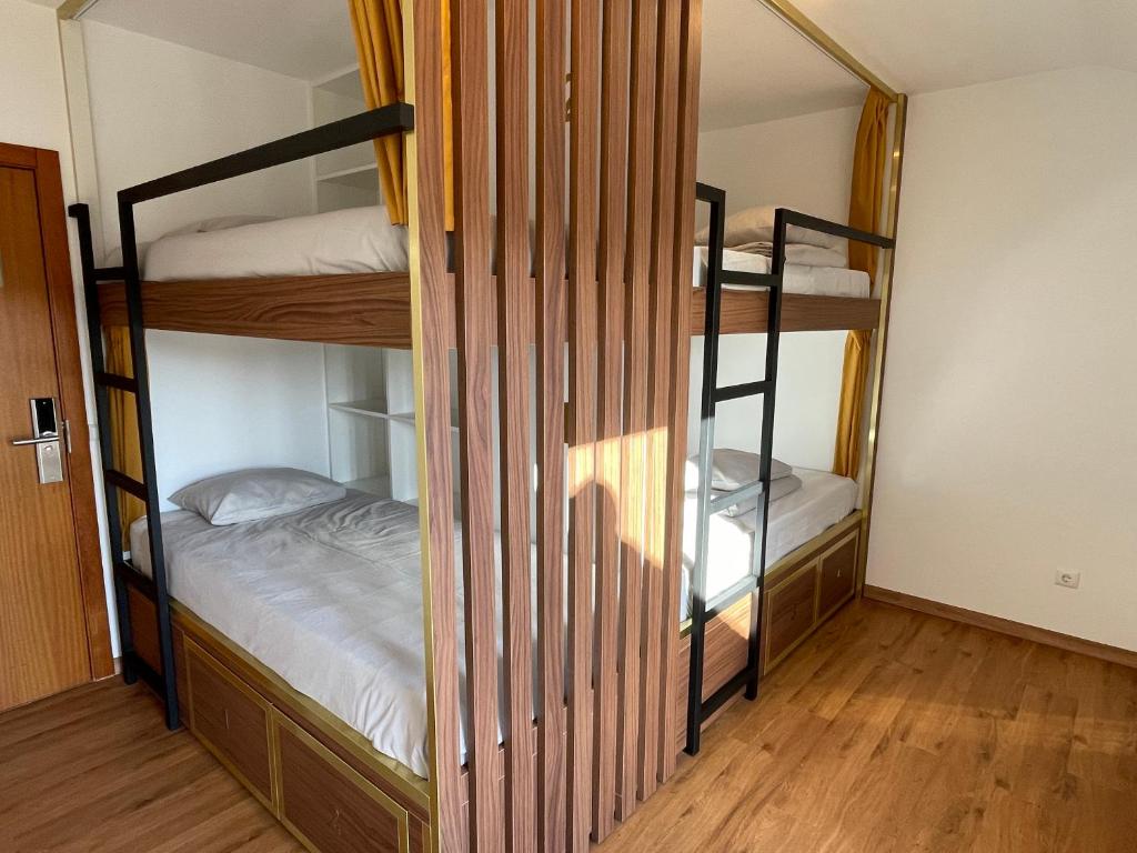 Postel nebo postele na pokoji v ubytování 33 Hostel
