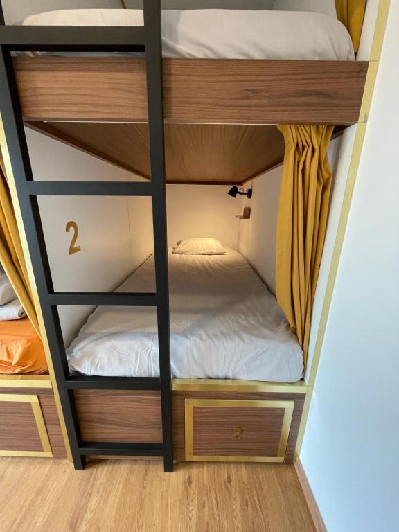 Postel nebo postele na pokoji v ubytování 33 Hostel