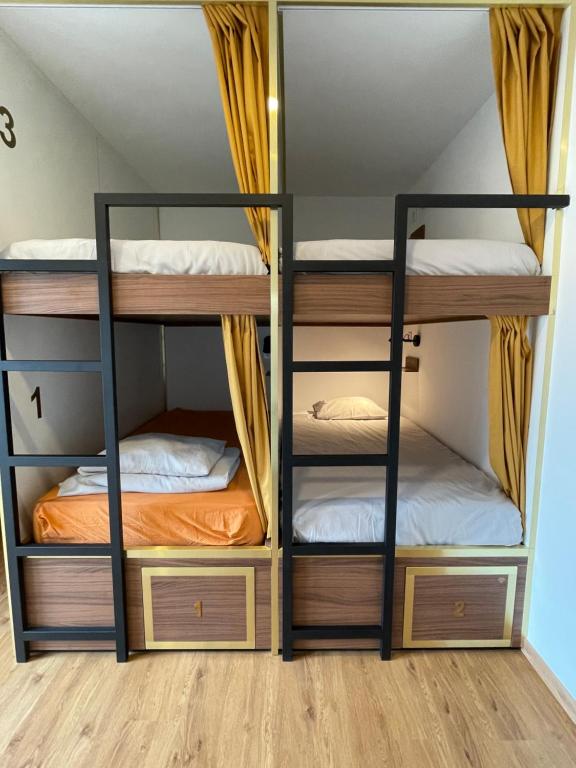 Postel nebo postele na pokoji v ubytování 33 Hostel
