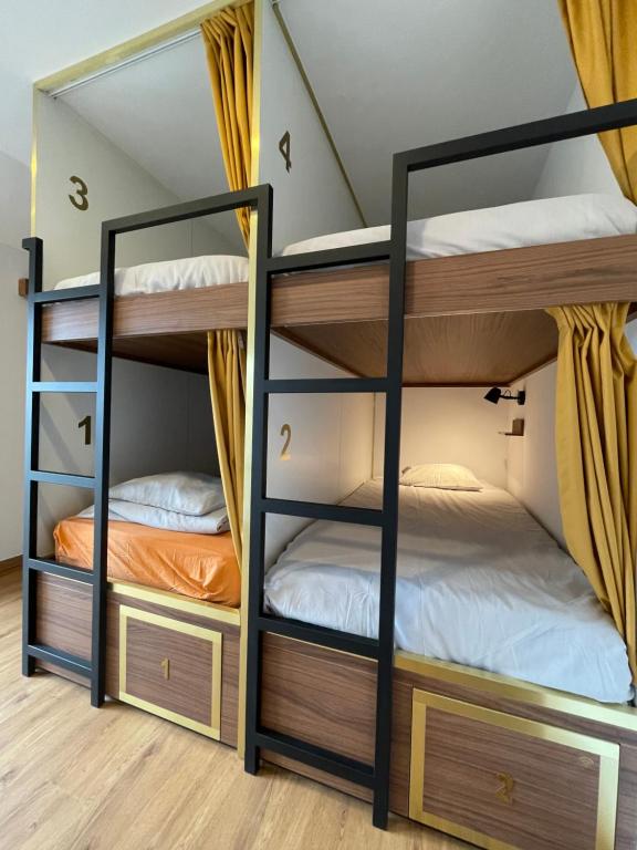 Postel nebo postele na pokoji v ubytování 33 Hostel