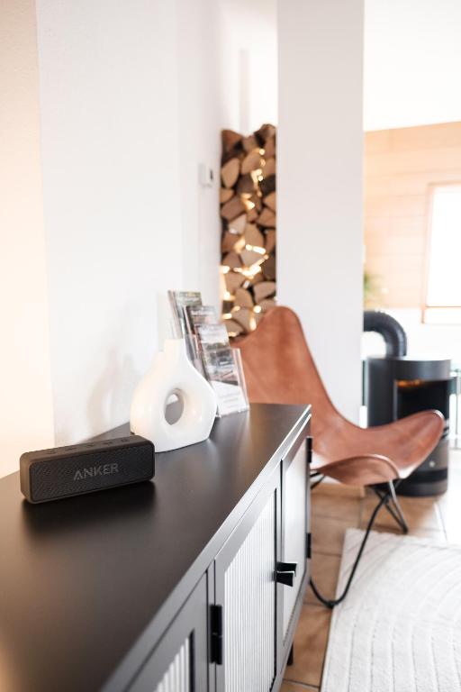 Posezení v ubytování NEU Deluxe Suite Münsterblick, Maisonette, Kingsize Bett, Küche, Netflix, Aussicht, E-Kamin