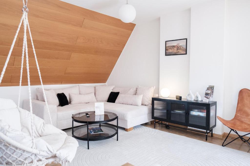 Posezení v ubytování NEU Deluxe Suite Münsterblick, Maisonette, Kingsize Bett, Küche, Netflix, Aussicht, E-Kamin