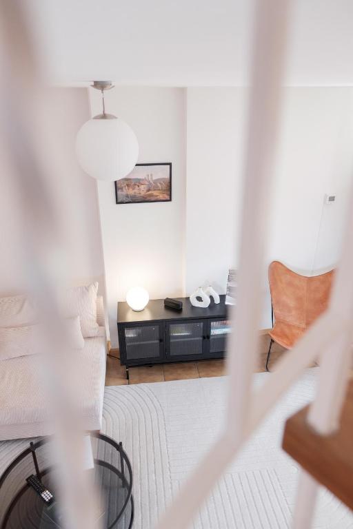 Posezení v ubytování NEU Deluxe Suite Münsterblick, Maisonette, Kingsize Bett, Küche, Netflix, Aussicht, E-Kamin