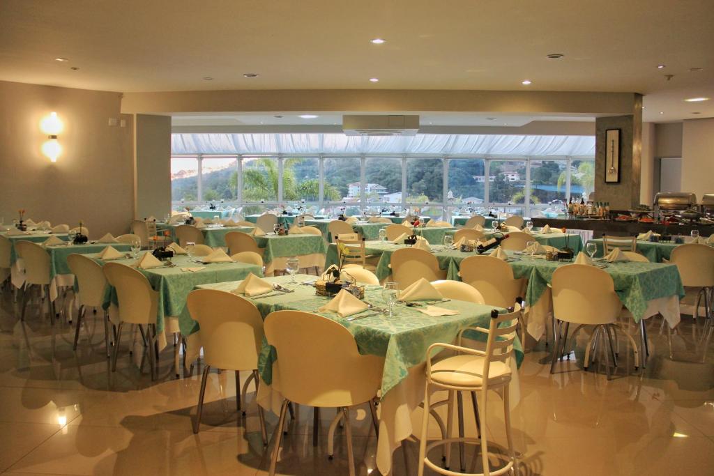 Um restaurante ou outro lugar para comer em Hotel Zanon