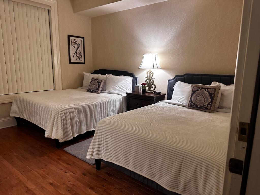 Postel nebo postele na pokoji v ubytování Hotel Belvidere