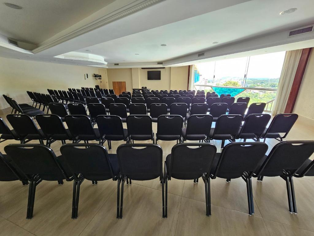 A área empresarial e/ ou a sala de conferências de Hotel Zanon