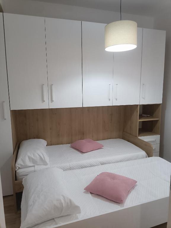 Postel nebo postele na pokoji v ubytování La Casa di Ary