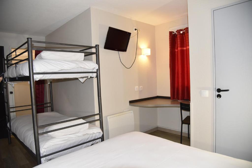 Postel nebo postele na pokoji v ubytování Hotel du Triangle