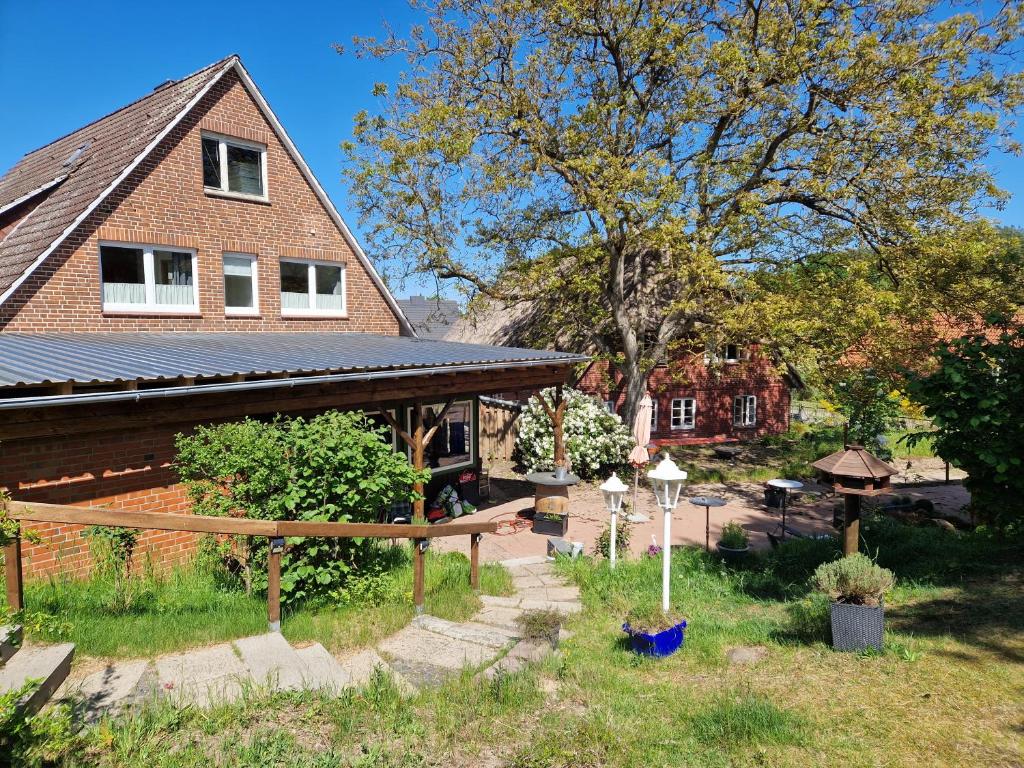 a house with solar panels on the roof at Kiek Inn in Hitzacker