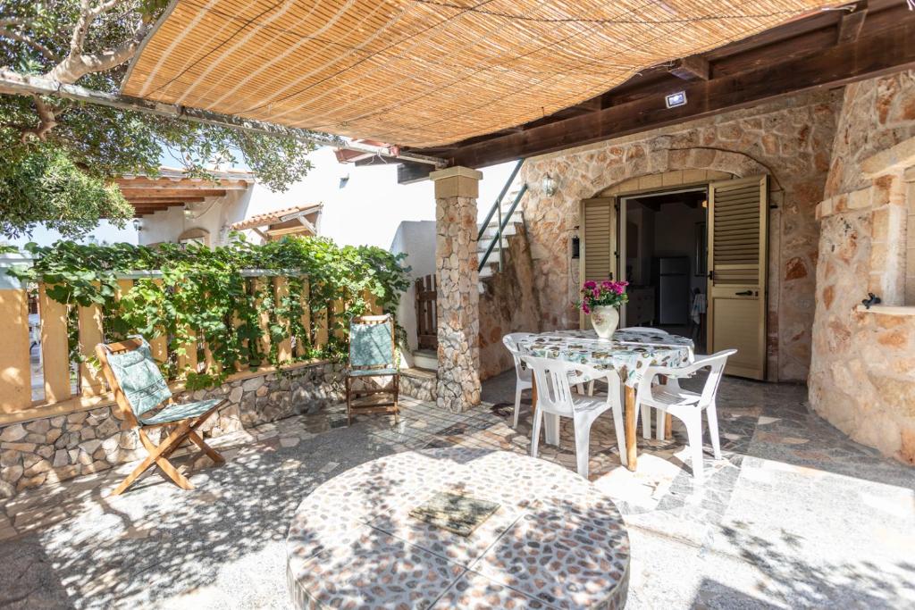 Patio nebo venkovní prostory v ubytování Villetta Azalea con giardino a Torre pali