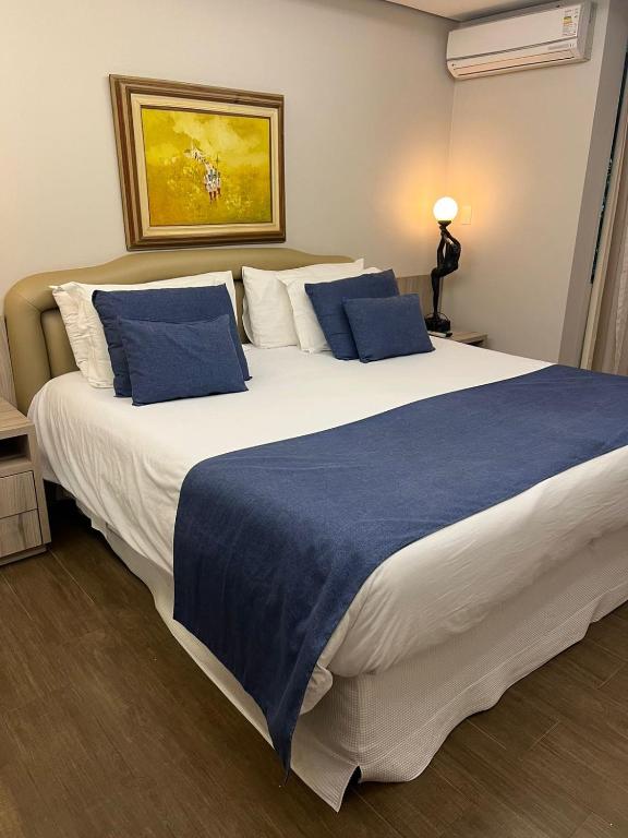 Postel nebo postele na pokoji v ubytování Rafain Palace Hotel & Convention Center