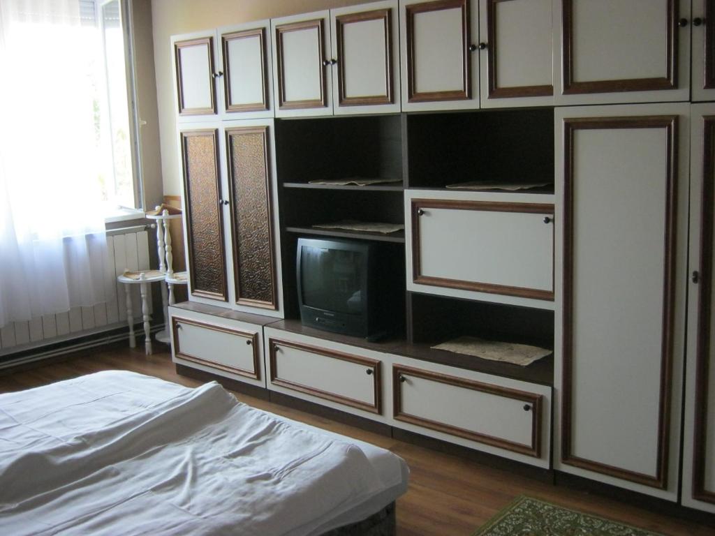 Posteľ alebo postele v izbe v ubytovaní Kitti Apartman