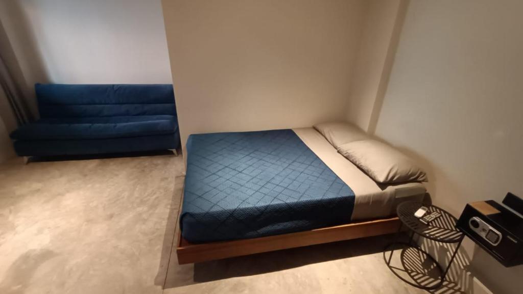 Una cama o camas en una habitación de Xùva