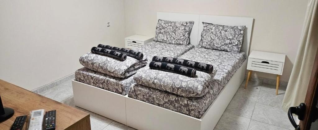 Ново ! Апартамент Dreams 1 tesisinde bir odada yatak veya yataklar