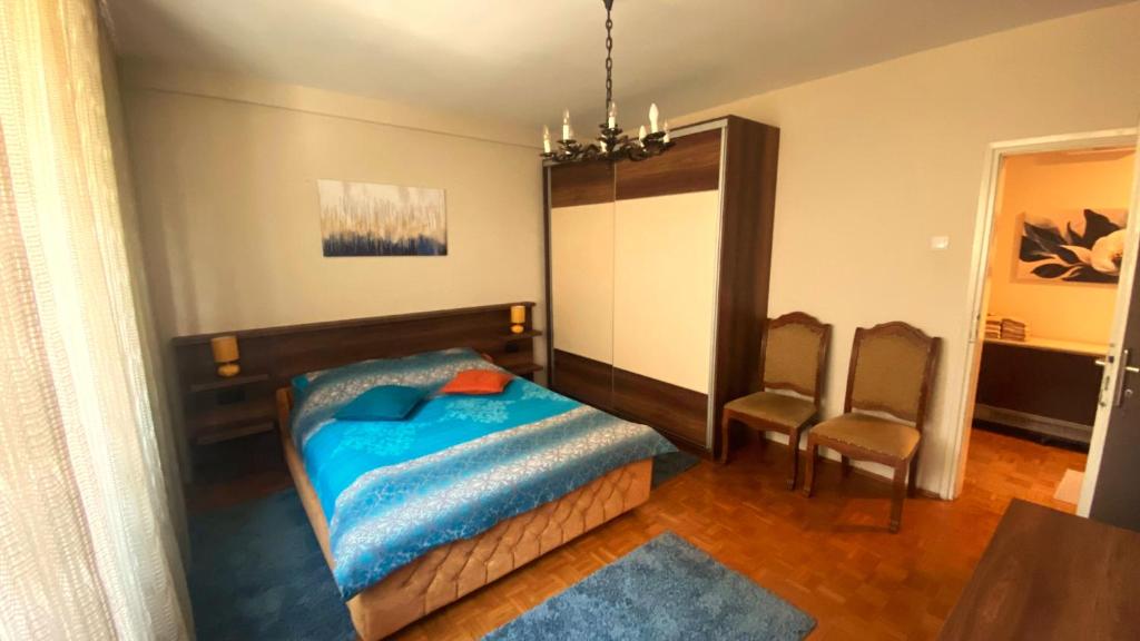 Postel nebo postele na pokoji v ubytování Central Park Apartment
