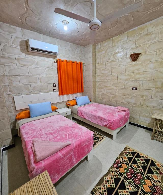 Letto o letti in una camera di ABU Guest House