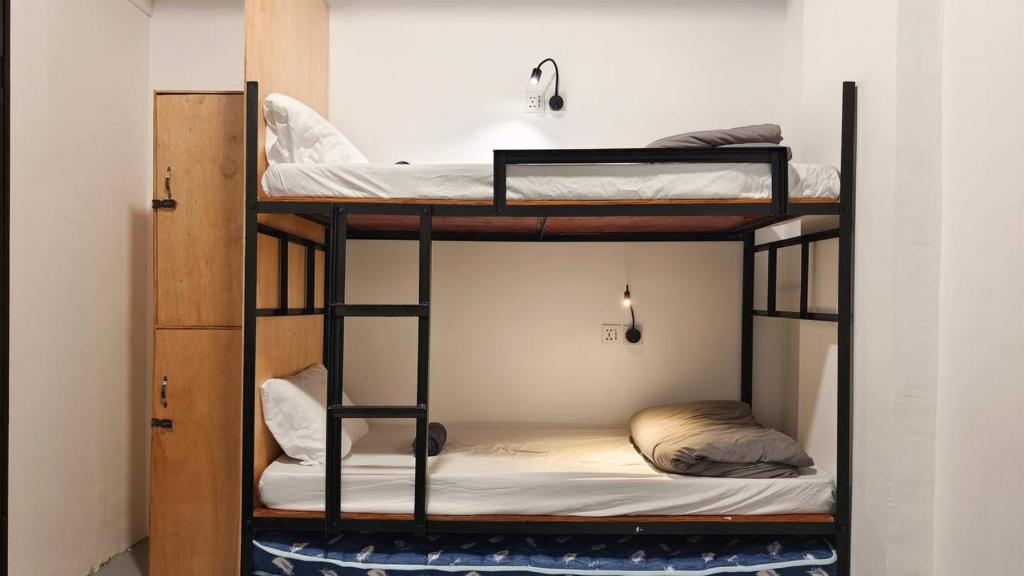 Postel nebo postele na pokoji v ubytování Warisan Homestay 18pax Kota Kinabalu