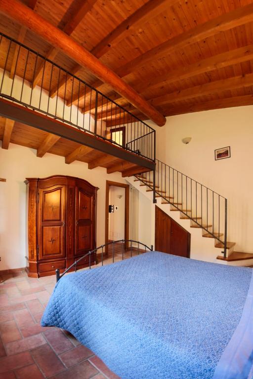 Postel nebo postele na pokoji v ubytování Agriturismo Case in Collina