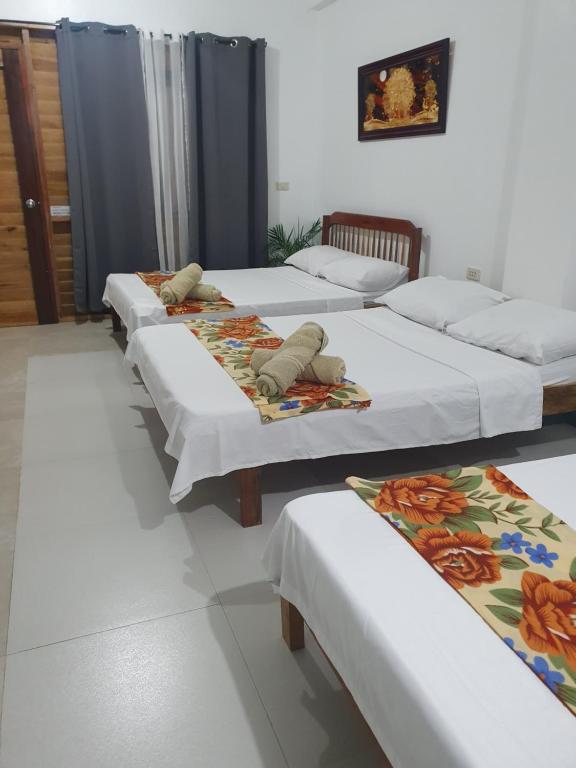Voodi või voodid majutusasutuse Maui Homestay toas