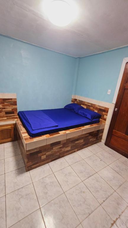 Voodi või voodid majutusasutuse Bastimentos Hill Guest House toas