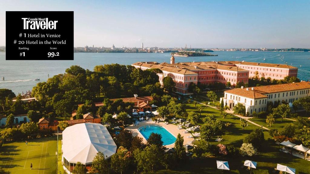an aerial view of a resort with a body of water at San Clemente Palace Kempinski Venice in Venice
