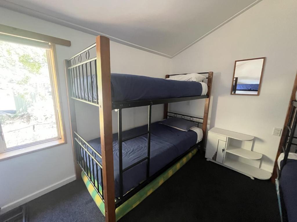 Postel nebo postele na pokoji v ubytování Kaikoura Seaside lodge