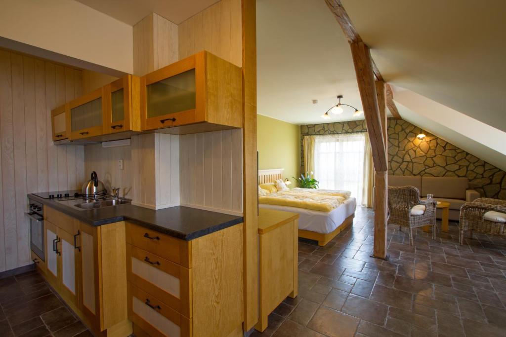 Łóżko lub łóżka w pokoju w obiekcie Hotel a restaurace Palfrig