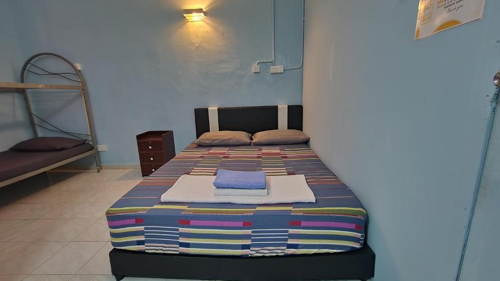 Postel nebo postele na pokoji v ubytování Knight Residence