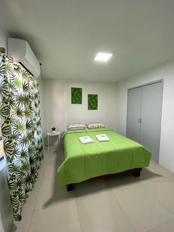 Postel nebo postele na pokoji v ubytování Forest View Leisure Residences