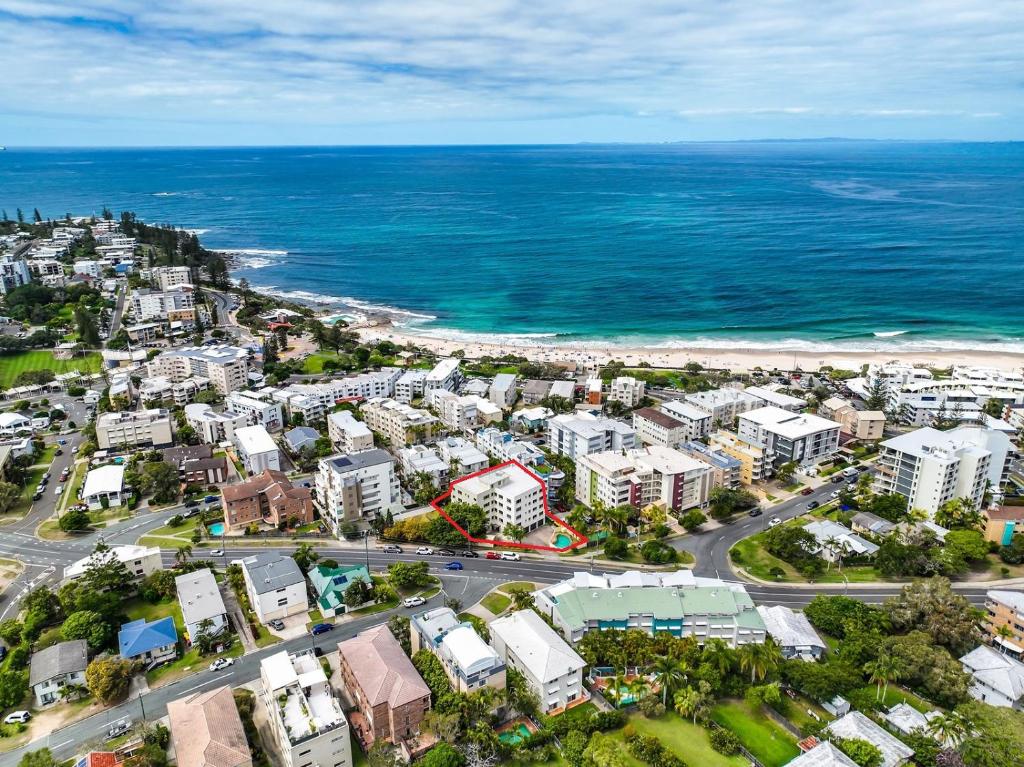 an aerial view of a city and the ocean at Kings Beachside Escape spacious apartment centrally located in Caloundra