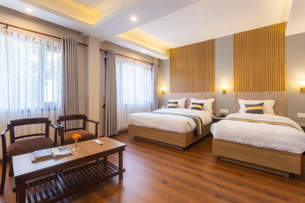 Postel nebo postele na pokoji v ubytování Aawas Boutique Hotel
