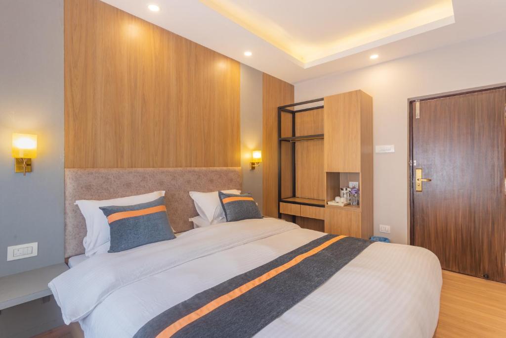 Postel nebo postele na pokoji v ubytování Aawas Boutique Hotel