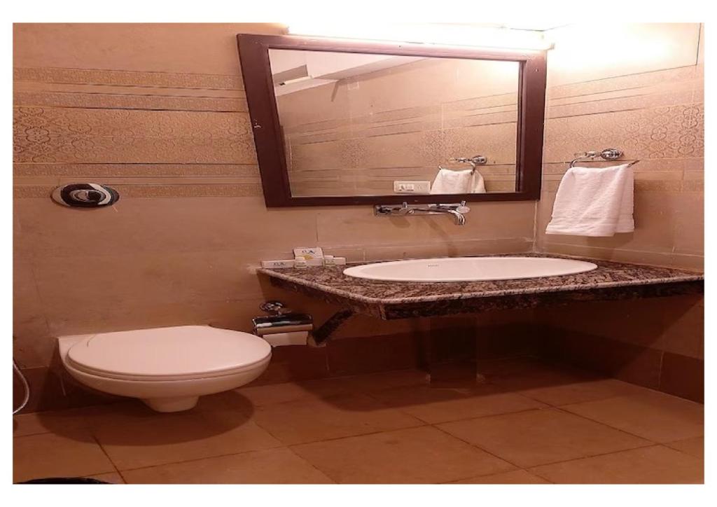 Koupelna v ubytování Hotel Ganga Aatitheyam