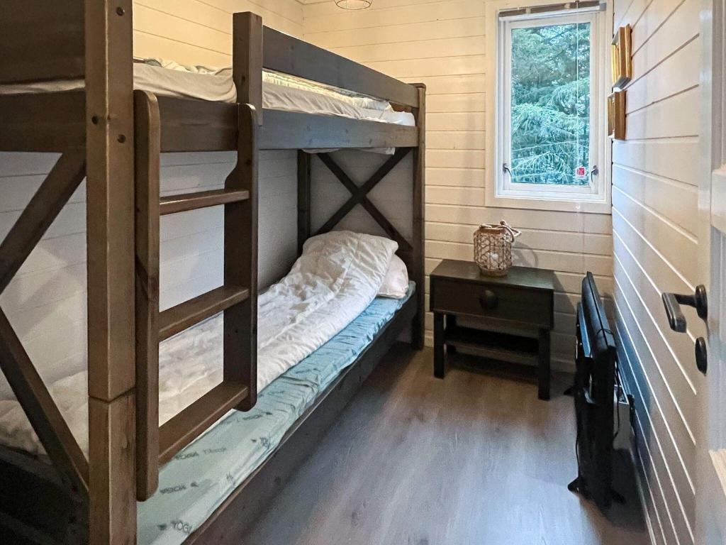 Postel nebo postele na pokoji v ubytování Holiday home bremnes V