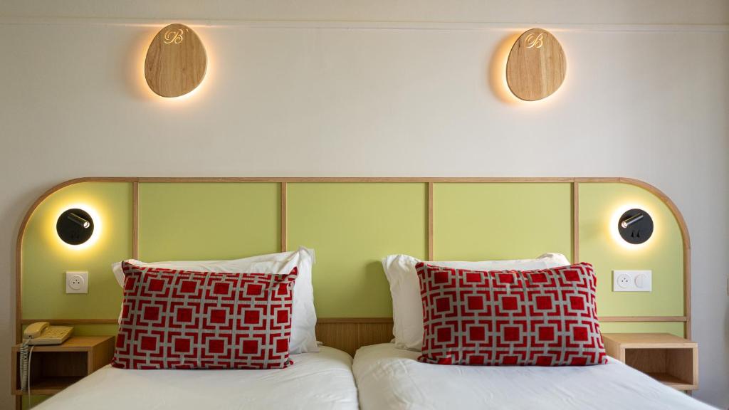 Postel nebo postele na pokoji v ubytování Hotel Boréal Nice