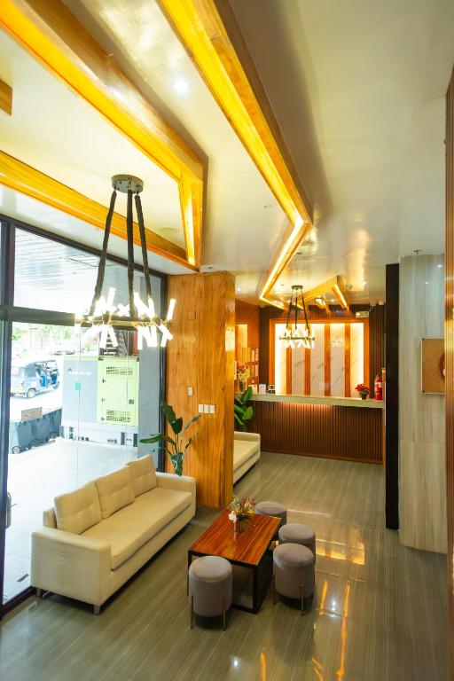 Postel nebo postele na pokoji v ubytování Raim Hotel