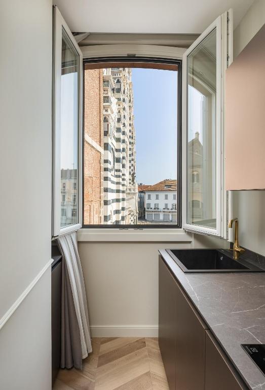 Zdjęcie z galerii obiektu Casa Duomo Luxury Suites w mieście Monza