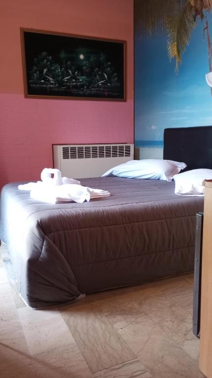 Postel nebo postele na pokoji v ubytování sleep well hotel total 2 stelle