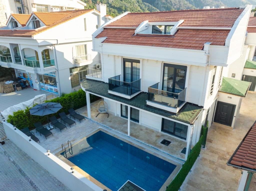 an aerial view of a house with a swimming pool at Villa Tutar 2 in Marmaris