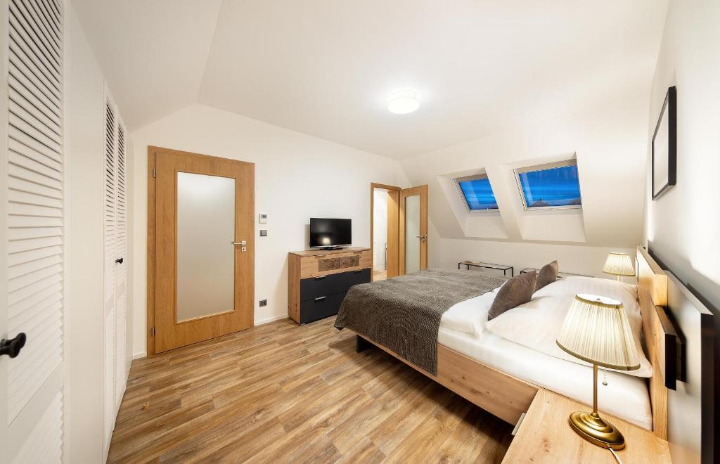 TV a/nebo společenská místnost v ubytování Pihel Apartments