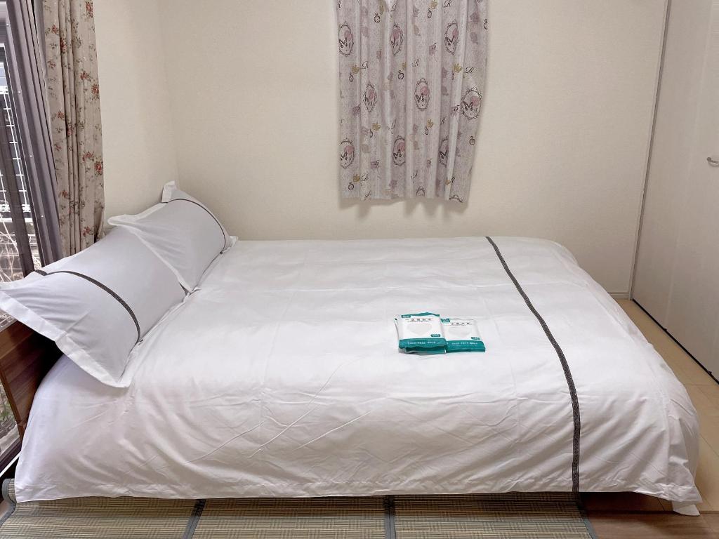Кровать или кровати в номере MiShe主题民宿