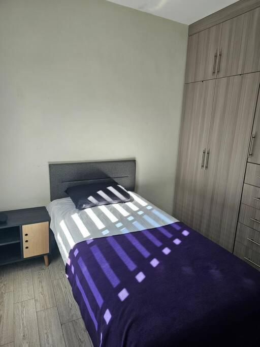 Postel nebo postele na pokoji v ubytování Estilo urbano: Depa. en el Corazón de la Ciudad