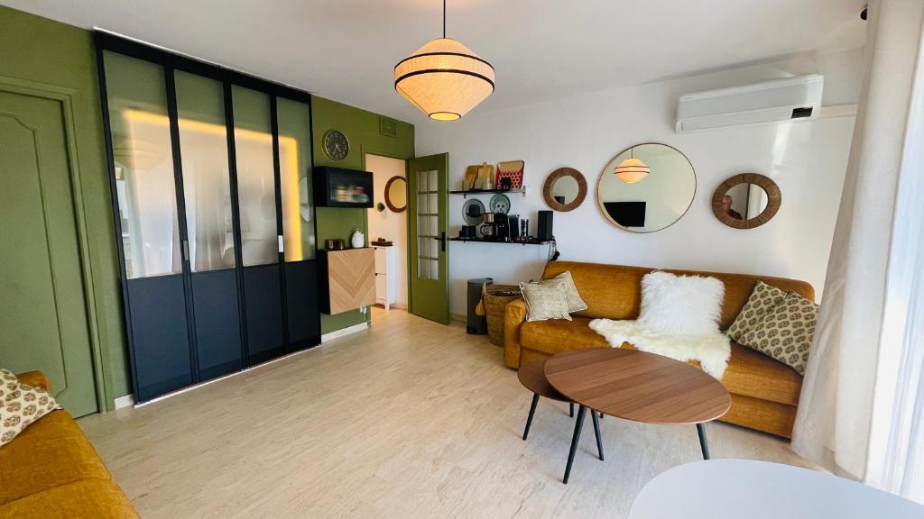 Posezení v ubytování Studio Vue Mer - terrasse - parking - plage