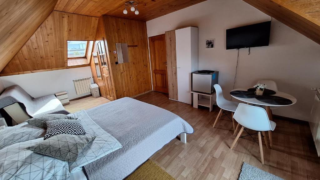 TV a/nebo společenská místnost v ubytování O.W. MEGA nad jeziorem