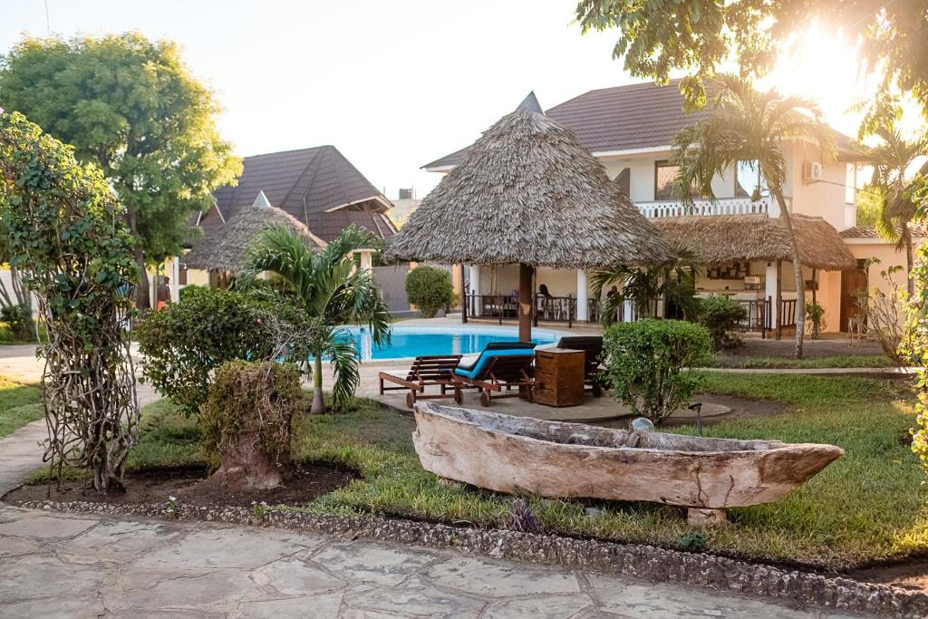 The swimming pool at or close to Diani-Paradise-Villas