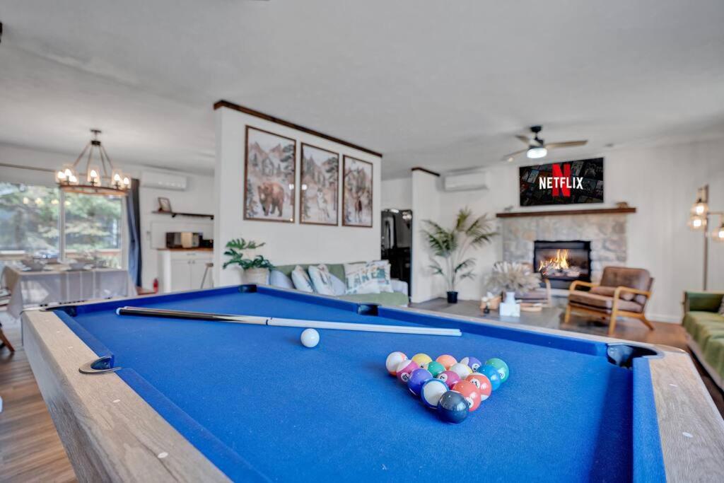 a living room with a pool table and a living room at Pool Table - Game Room - Spacious Home in Poconos in Pocono Summit