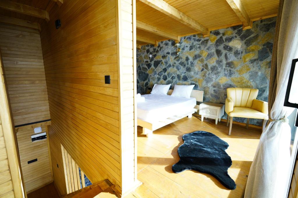 Postel nebo postele na pokoji v ubytování Venek Viila Suit