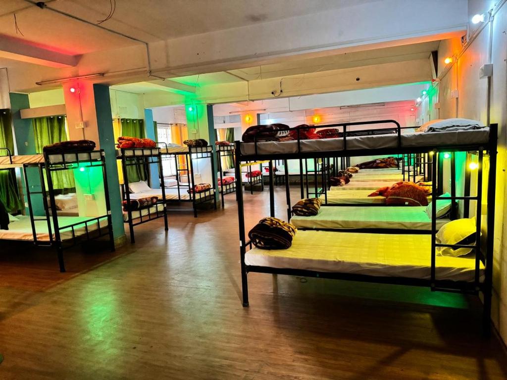 a group of bunk beds in a room at Relax Zone in Patna