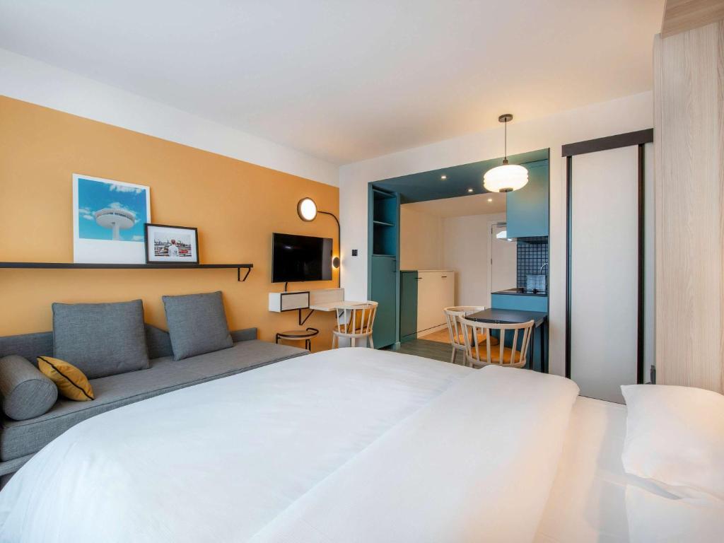Postel nebo postele na pokoji v ubytování Aparthotel Adagio access Hamburg